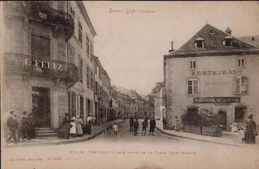 Saint-Dié (Vosges). Rue du Président Wilson prise de la Place Saint-Martin.