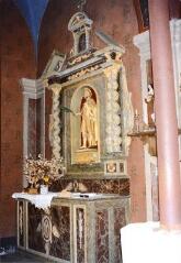 Vaudéville - église Saint-Quirin. – Vue d'un autel secondaire et de son retable ; statue de saint Quirin.